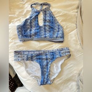 Size M two piece halter bathing suit.